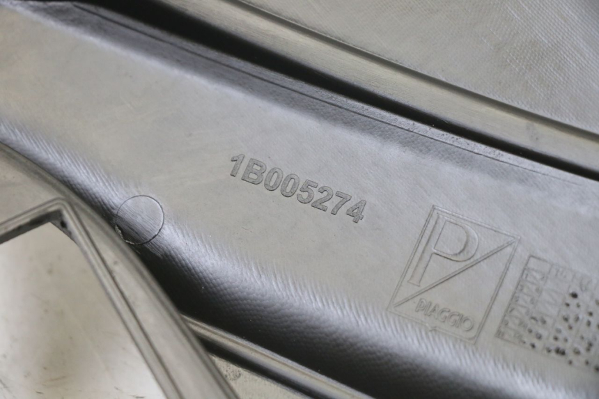 photo de CACHE SOUS SELLE GAUCHE APRILIA SR 2T 50 (2018 - 2022)