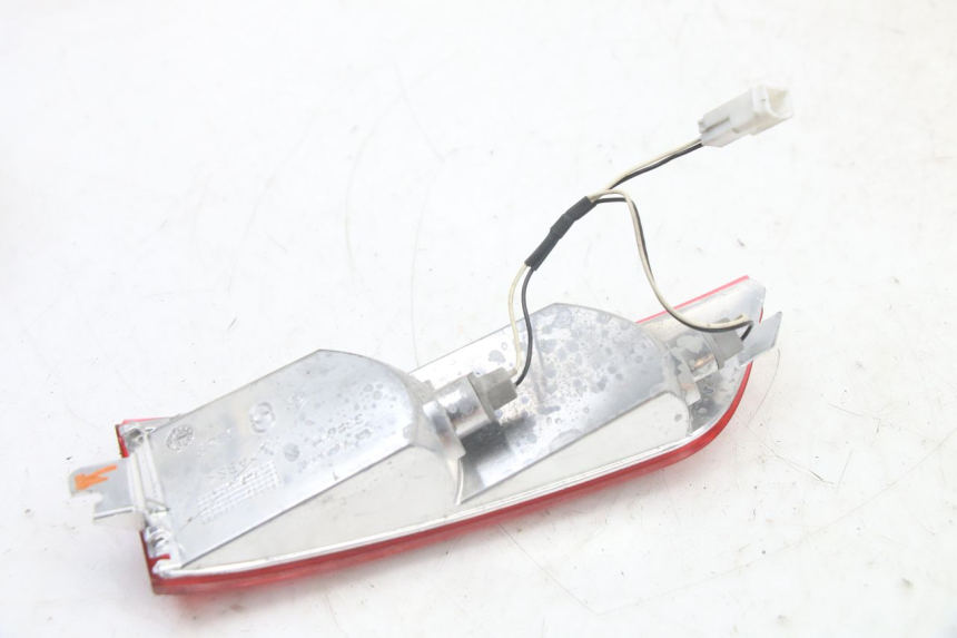 photo de CLIGNOTANT ARRIERE GAUCHE PIAGGIO XEVO - X EVO 125 (2007 - 2017) - État de surface