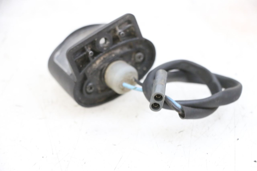 photo de ECLAIRAGE DE PLAQUE YAMAHA YP MAJESTY 125 (2002 - 2006) - Zoom état d’usage