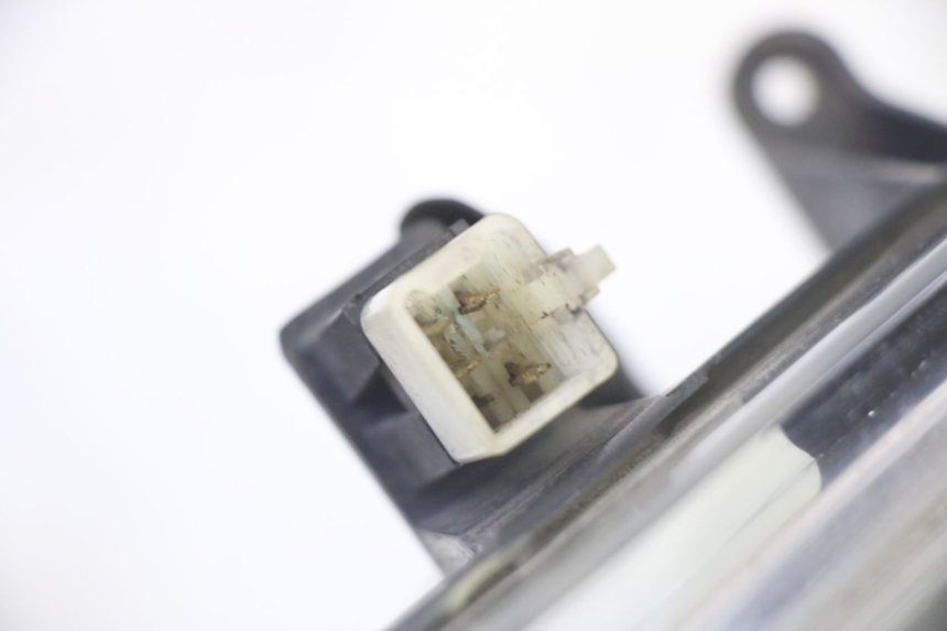 photo de PHARE AVANT PEUGEOT SATELIS 125 (2006 - 2009)