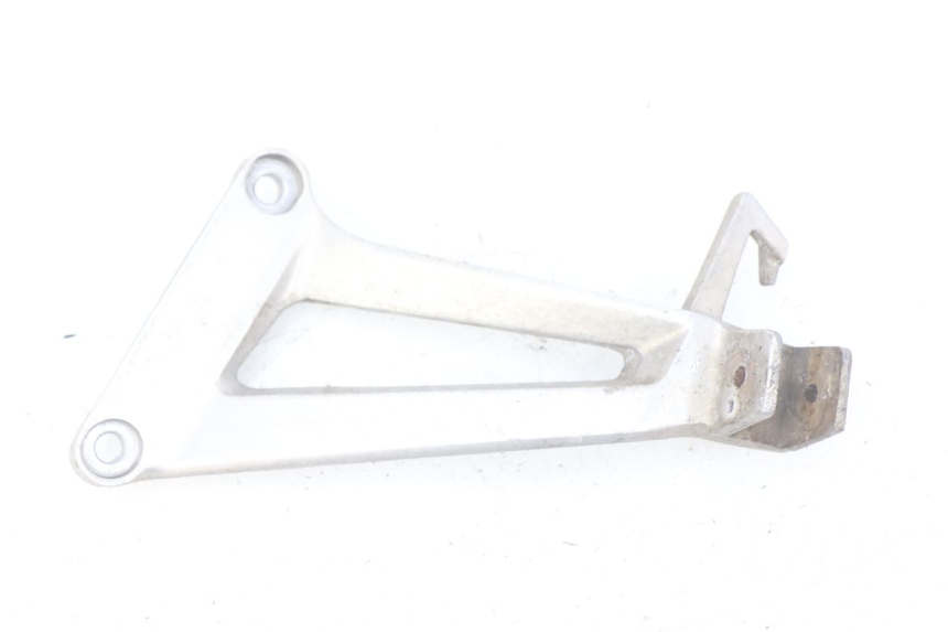 photo de PLATINE CALE PIED ARRIERE GAUCHE HONDA CBR R 125 (2003 - 2006)