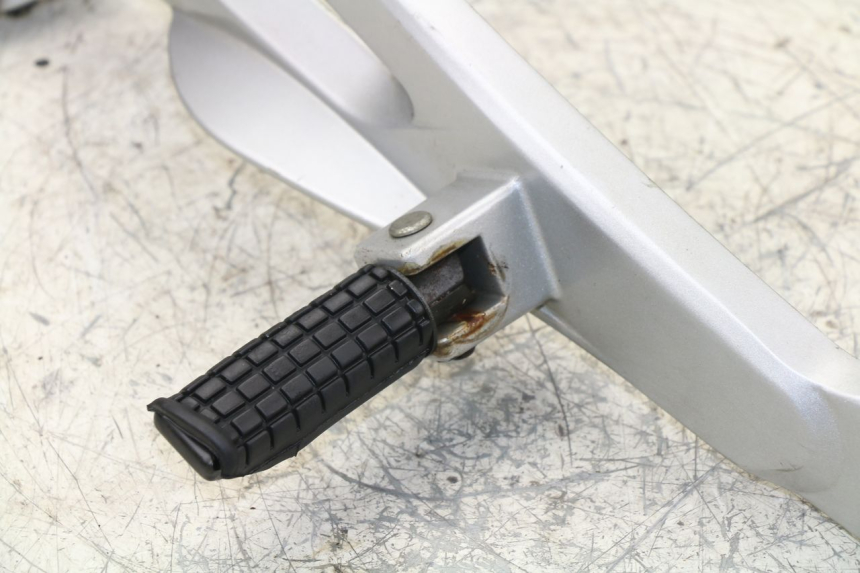 photo de PLATINE CALE PIED AVANT GAUCHE HONDA NTV DEAUVILLE 650 (2001 - 2006)